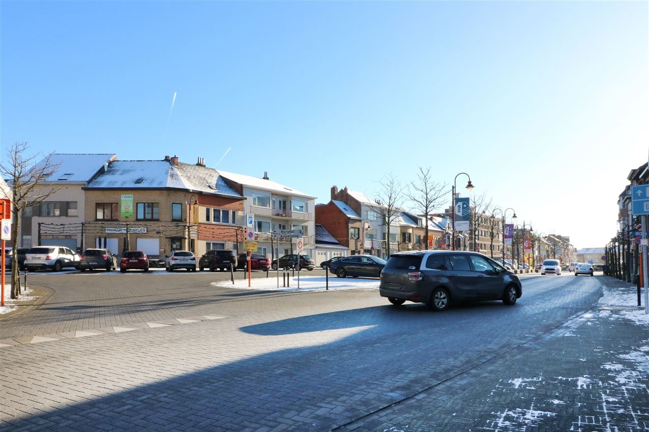 Opbrengsteigendom van 4 appartementen en handelsgelijkvloers centrum foto 3