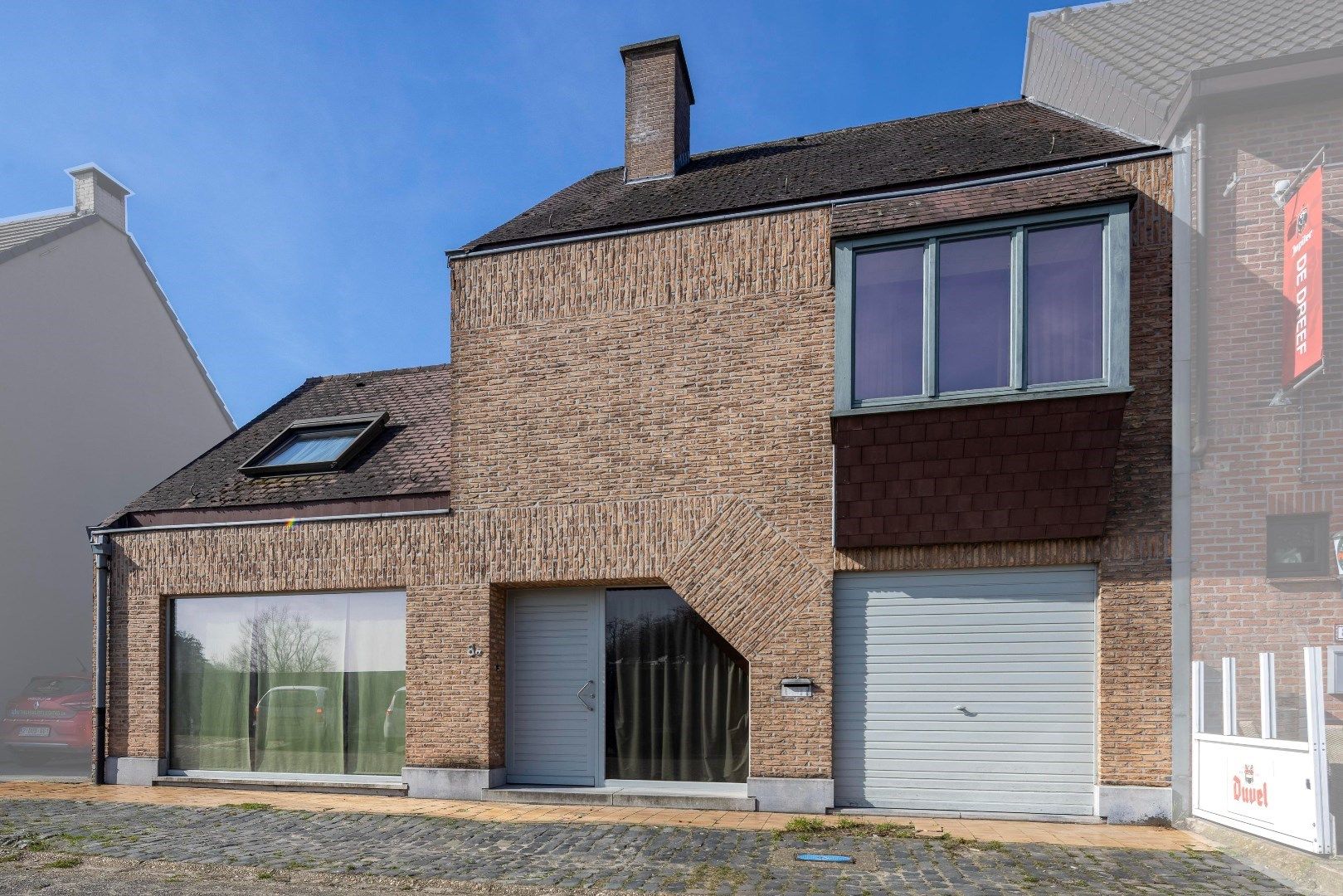 Ruime gezinswoning met 3 tot 4 slaapkamers, garage en tuin met achteruitgang foto 2