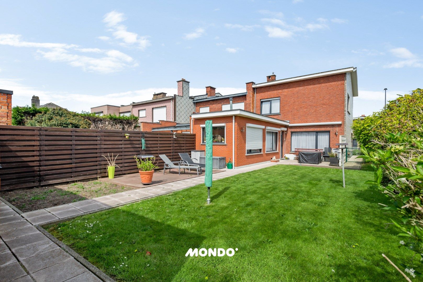half-open bebouwing met twee garageboxen foto 6