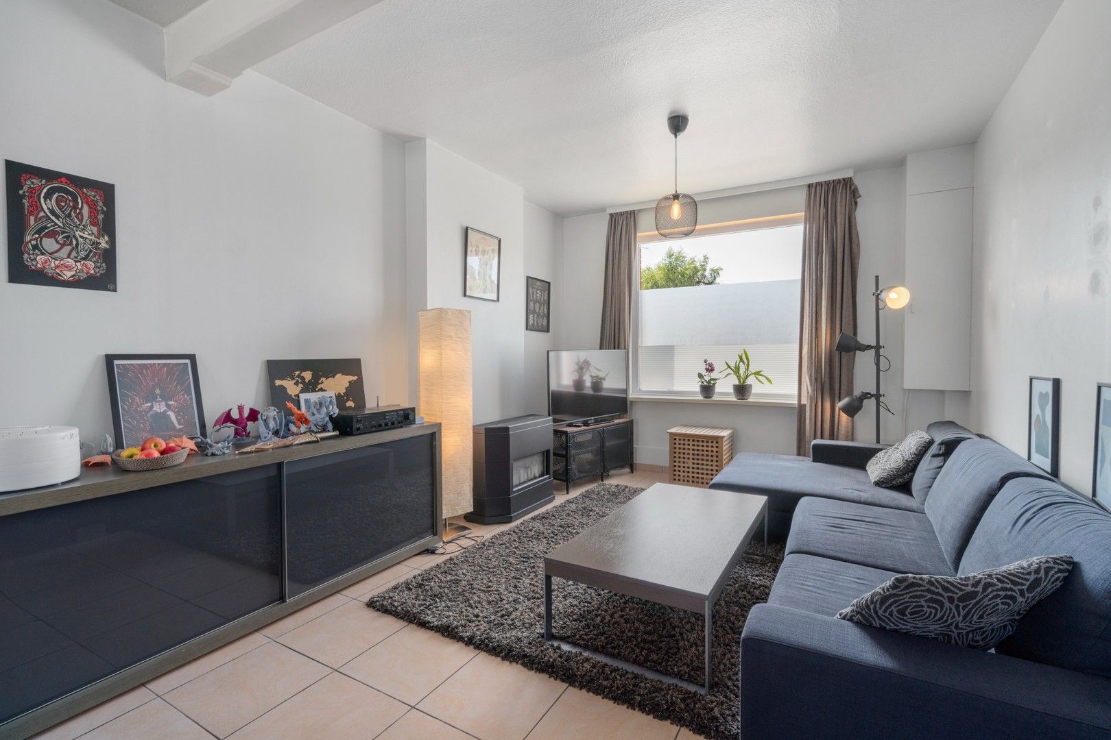 Halfopen woning met tuin en garages in het centrum van Nevele! foto 11