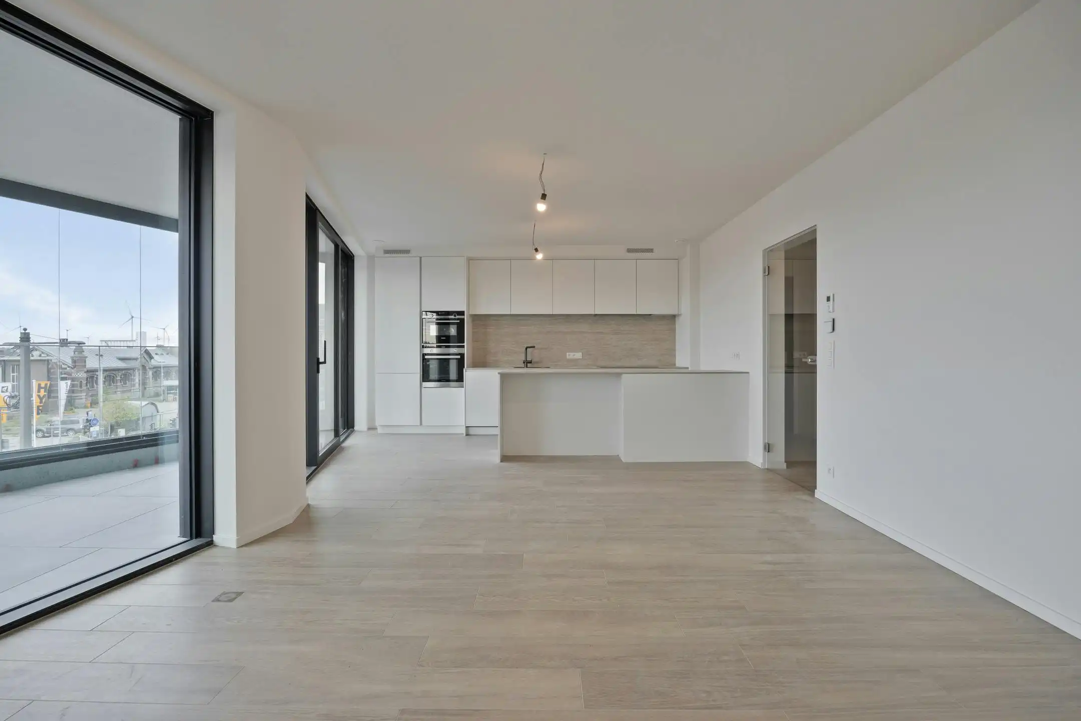 A0203 Rivert nieuwbouwappartement te Antwerpen  foto {{pictureIndex}}