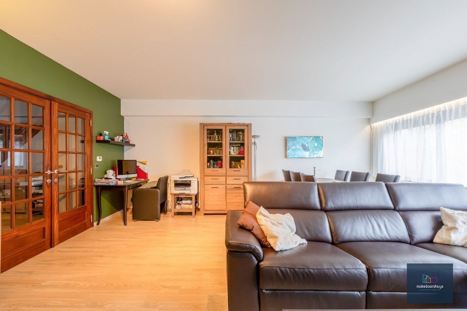 Heel ruime Instapklare woning in rij  met zonneterras en 2 staanplaatsen foto 7