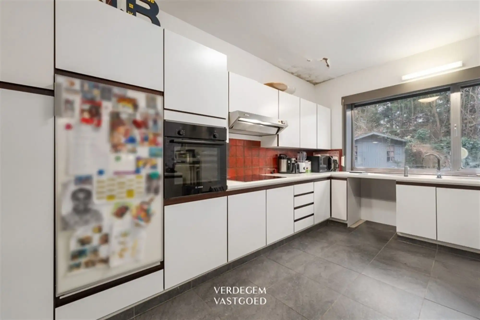 Ruime woning met 5 slaapkamers, zuidwestgerichte tuin en inpandige garage met oprit in een rustige straat foto 8