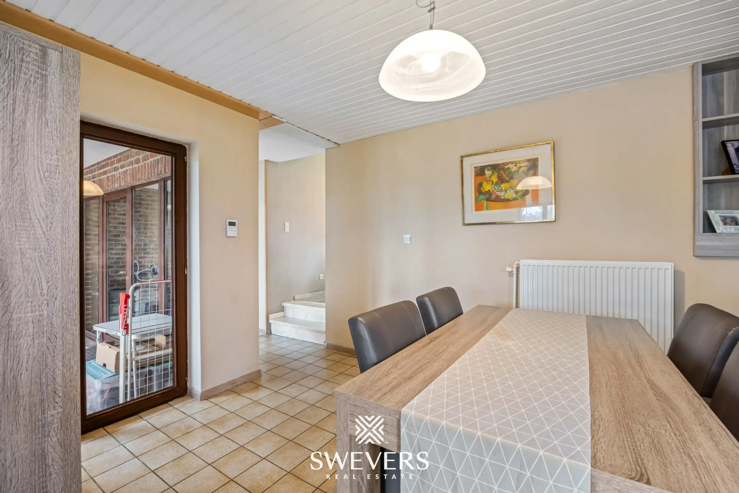 Zonnige woning met ruime zuid georiënteerde tuin in het rustige Diepenbeek foto 13