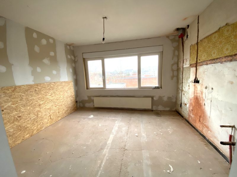 GEDEELTELIJK TE RENOVEREN woning centrum Geel met inpandige garage foto 14