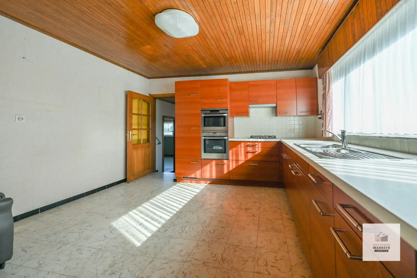 Te renoveren gelijkvloerse woning met  3slpk, garage, tuin op 1290m2 foto 10