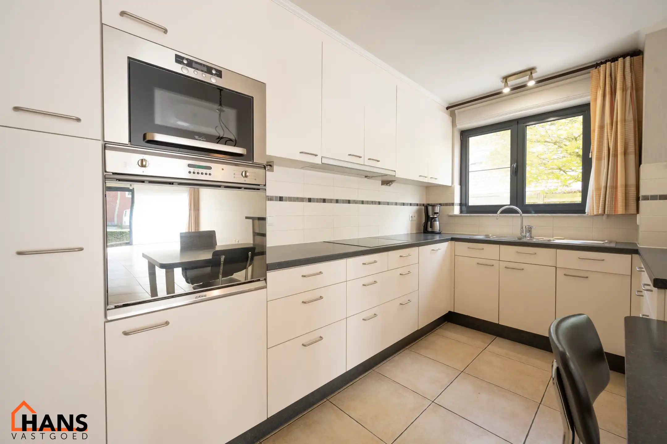 Uniek gelijkvloers appartement. foto 6