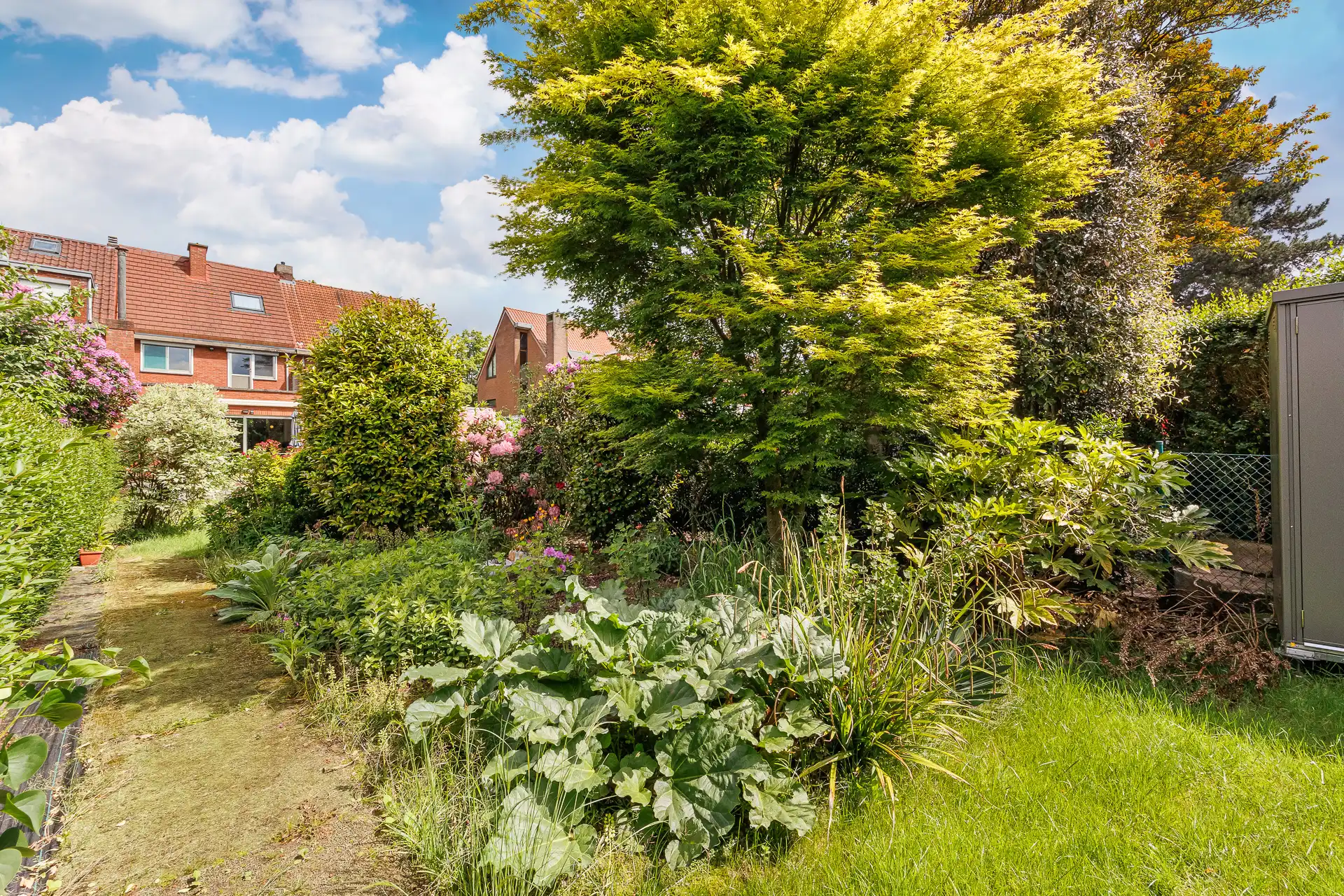 Prachtige woning met zuidgeoriënteerde tuin op toplocatie! foto 5