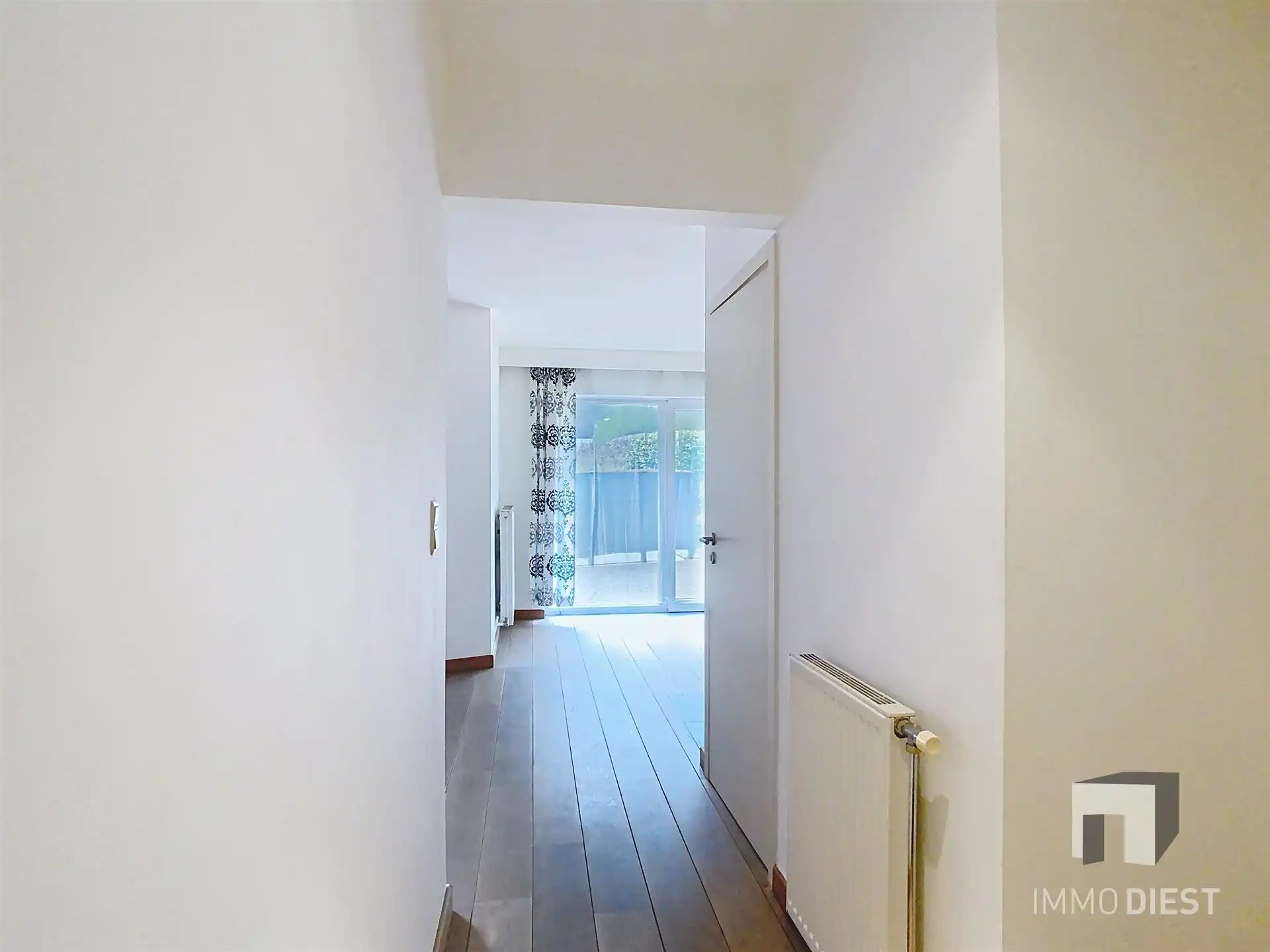 Gelijkvloers appartement met ingesloten koertje foto 2