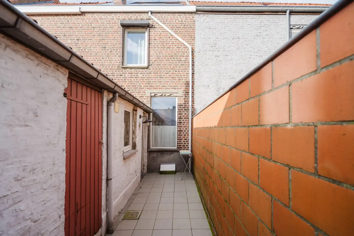 Stadswoning met koer foto 12