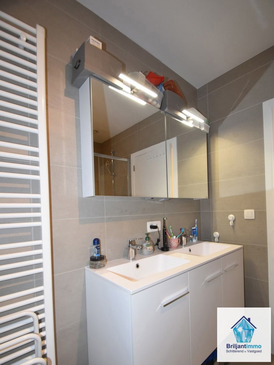 Energiezuinig gelijkvloers appartement met 3 slpkmrs & tuin foto 12
