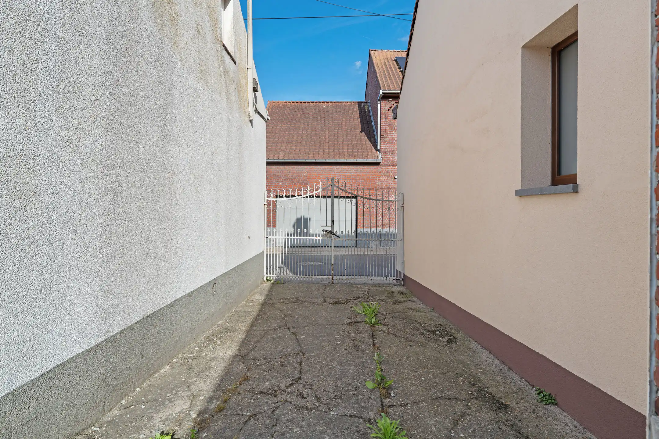 Charmante 3-gevelwoning met garage en tuin foto 19