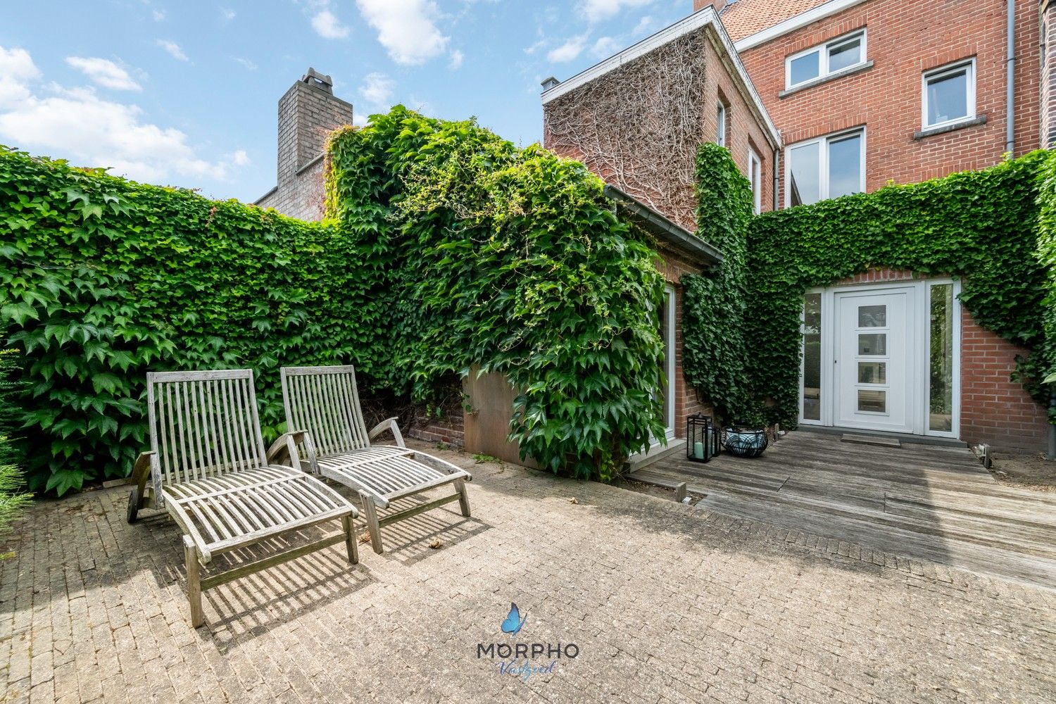 Karaktervolle woning (221 m²) met tuin en 5 parkeerplaatsen in centrum Ruddervoorde foto 5