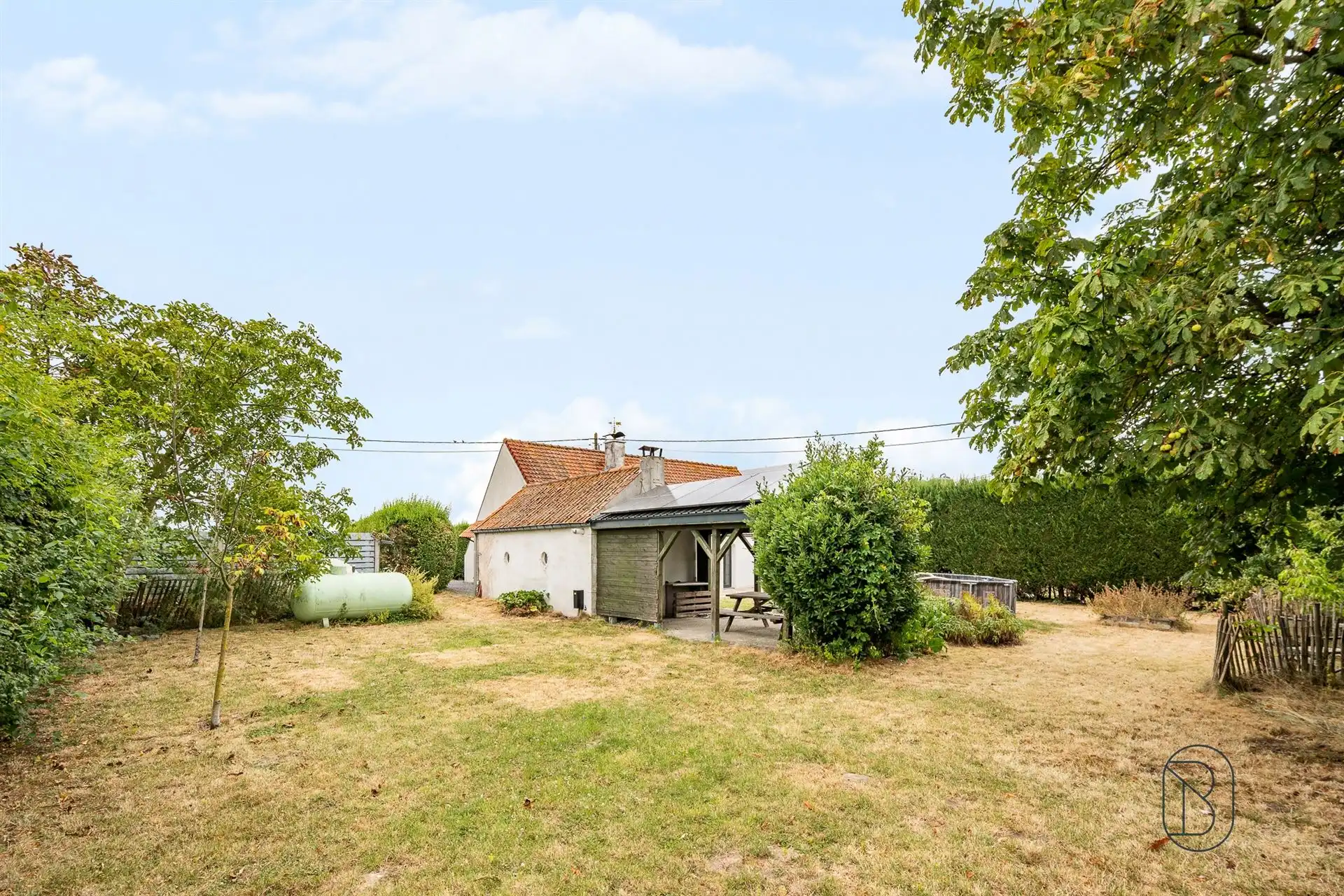 Landelijke woning met 3 slaapkamers, garage en ruime tuin foto 3