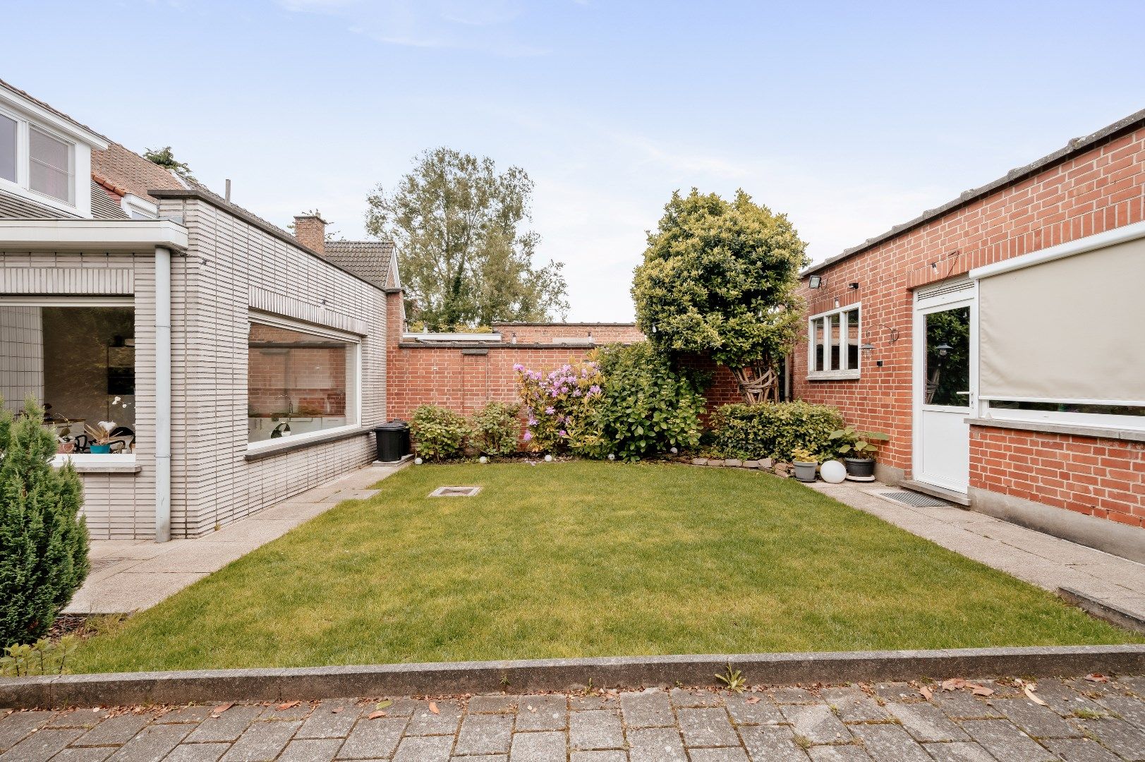 Halfopen woning met tuin, garage en loods 140m² foto 19