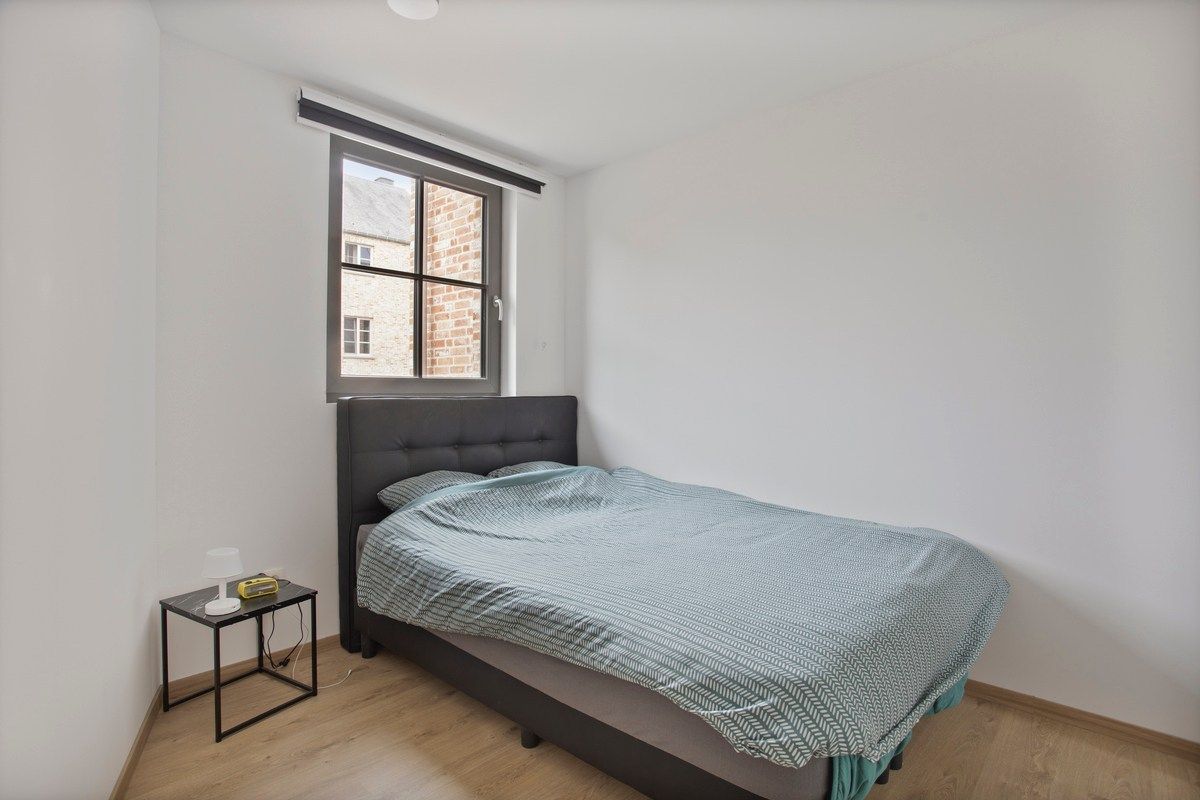 Gelijkvloers BEN-appartement met grote privétuin en parkeerplaats foto 14