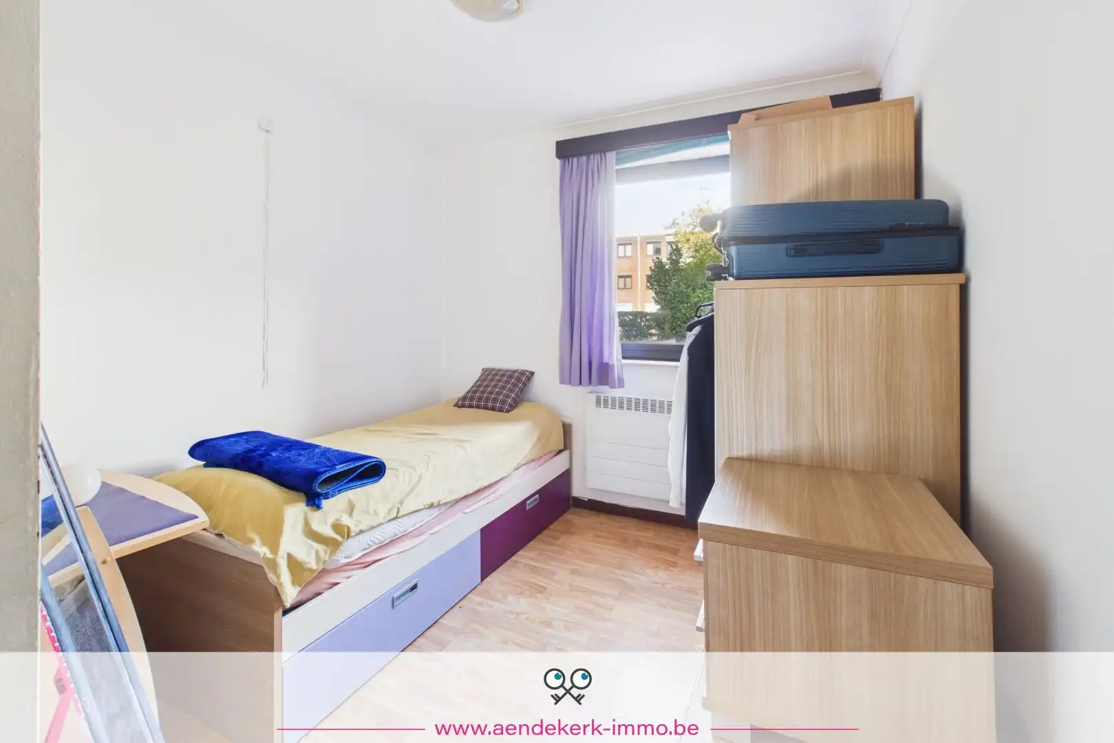 Ruim gelijkvloers appartement met 3 slaapkamers, garage en kelderberging foto 16