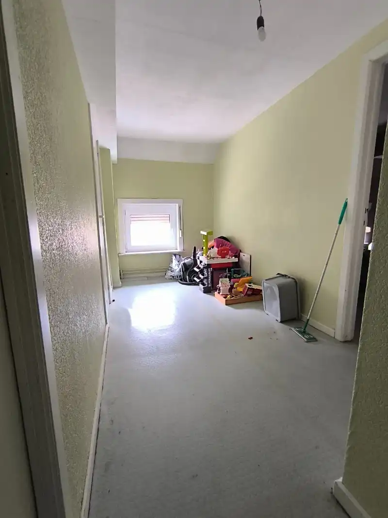 Rijwoning met garage en tuin foto 7