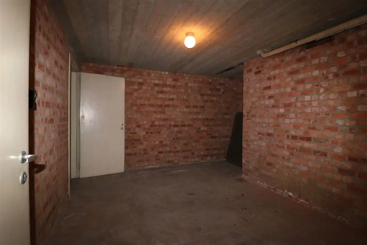 Centraal gelegen app. met 2 slpk. en garage foto 25