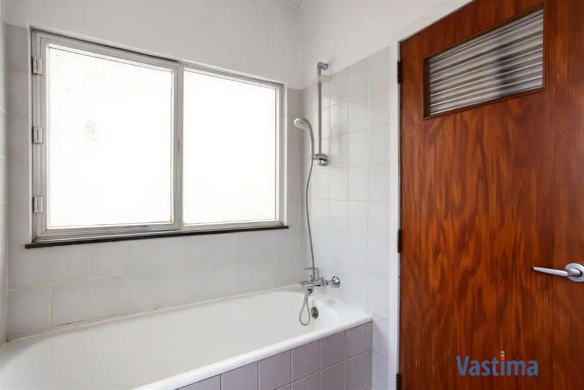 Deels gerenoveerde rijwoning met tuin nabij centrum Lebbeke foto 7