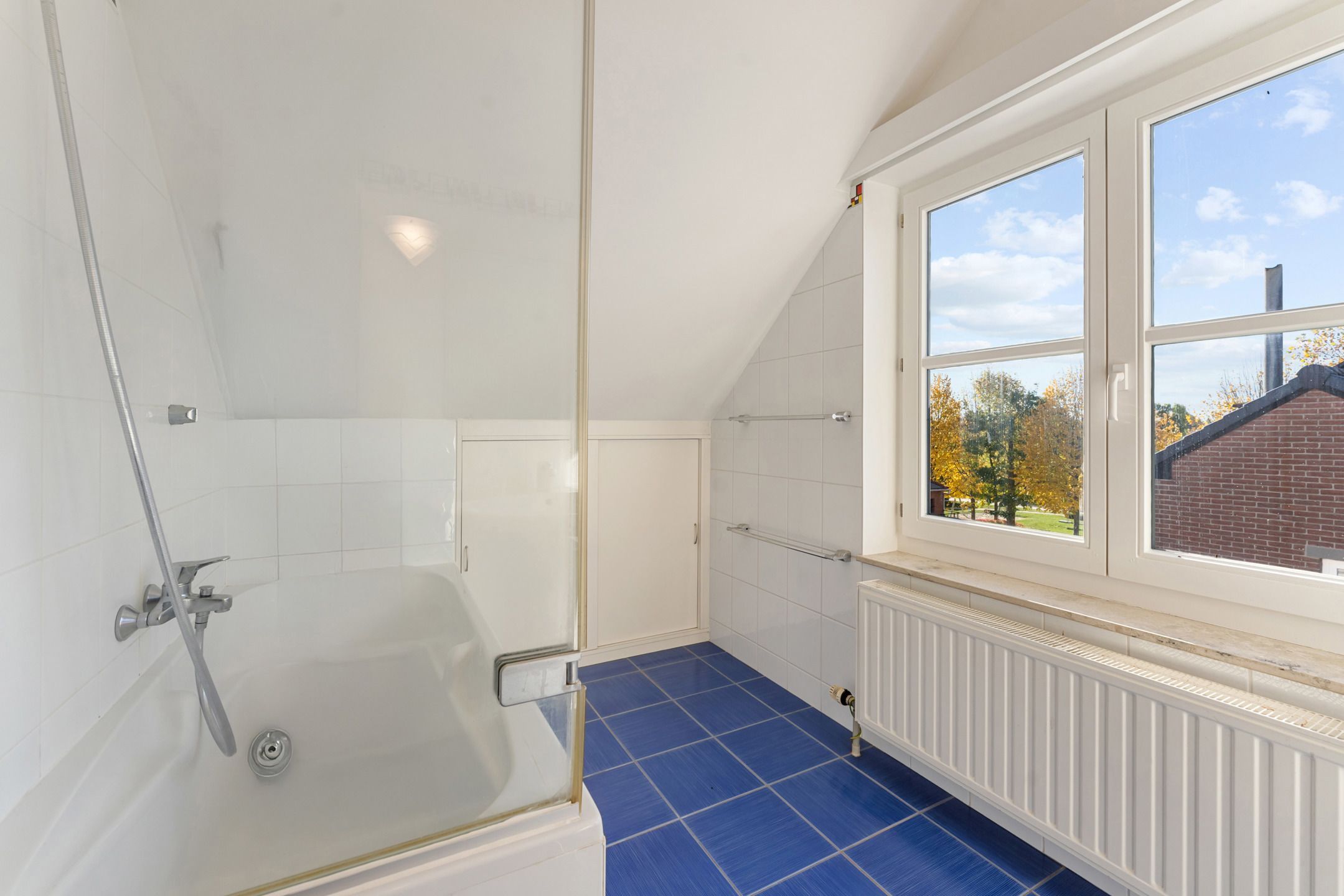 Duplex appartement met garage te Heukelom foto 22