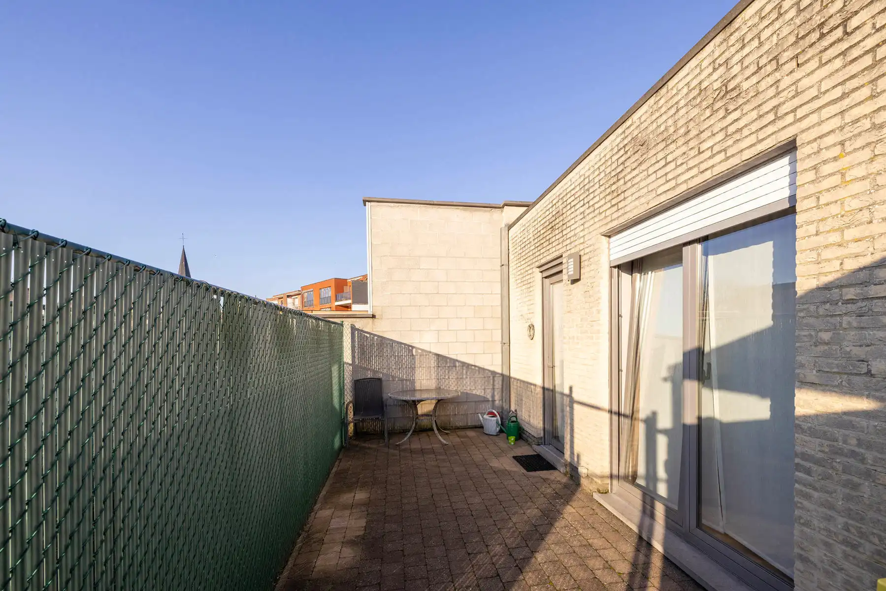 GLV app (132m²) met 2slpk, terras, garagebox en kelder foto 17