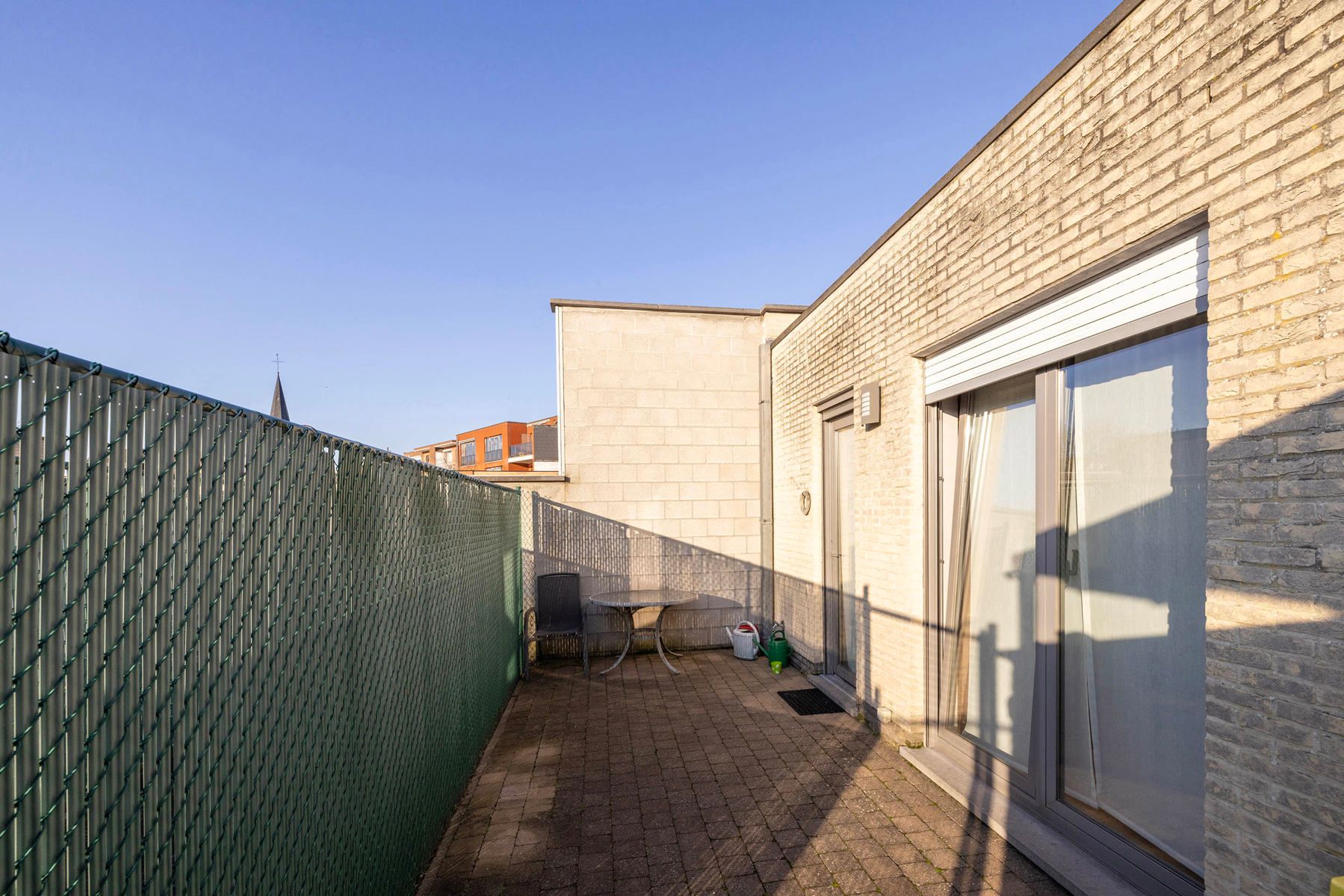 GLV app (132m²) met 2slpk, terras, garagebox en kelder foto 17