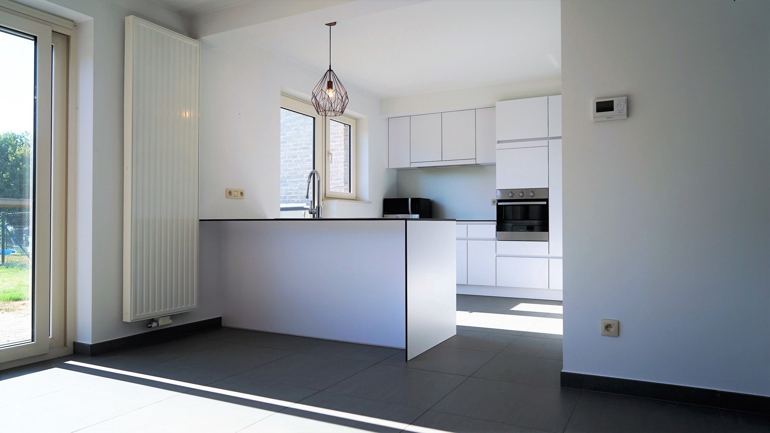 Gelijkvloersappartement met tuin en staanplaats foto 7