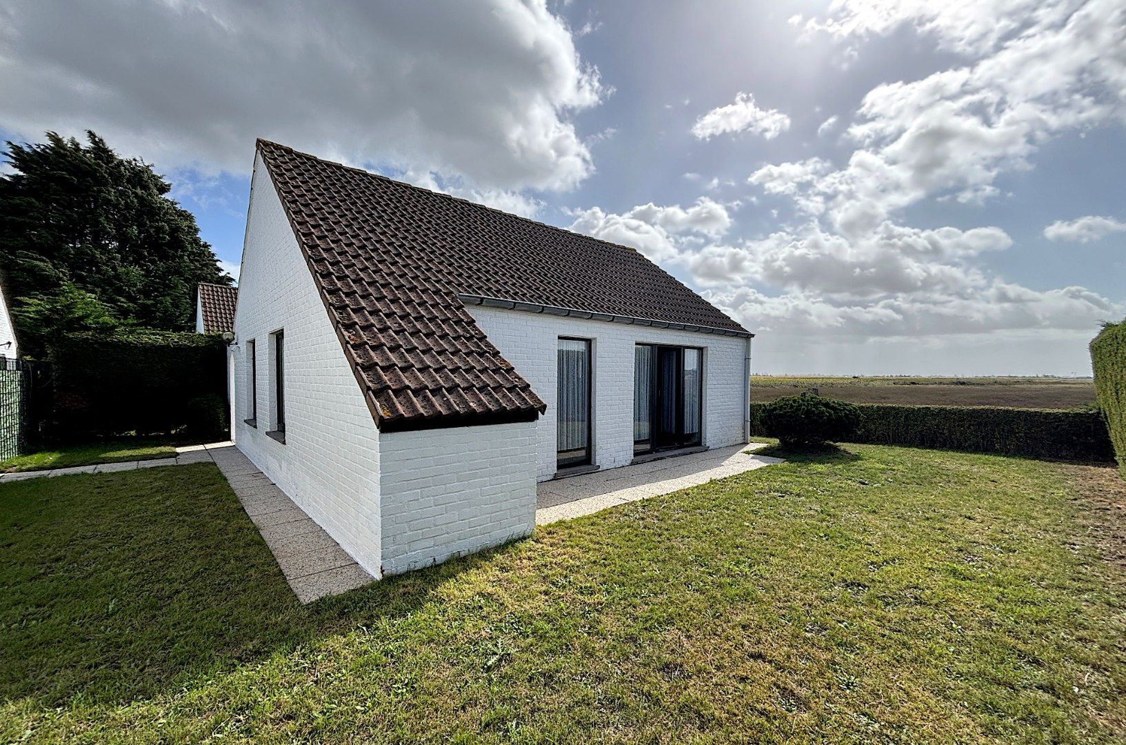 Hoofdfoto van de publicatie: Vakantiewoning met prachtig uitzicht op de velden. 