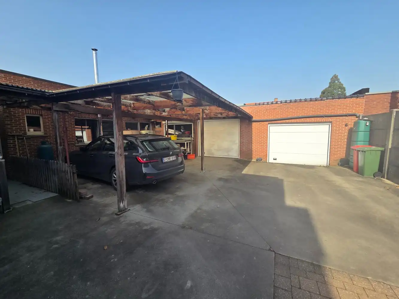 Woonhuis met aangebouwd werkatelier of polyvalante ruimte en garage aanbouwen foto 16
