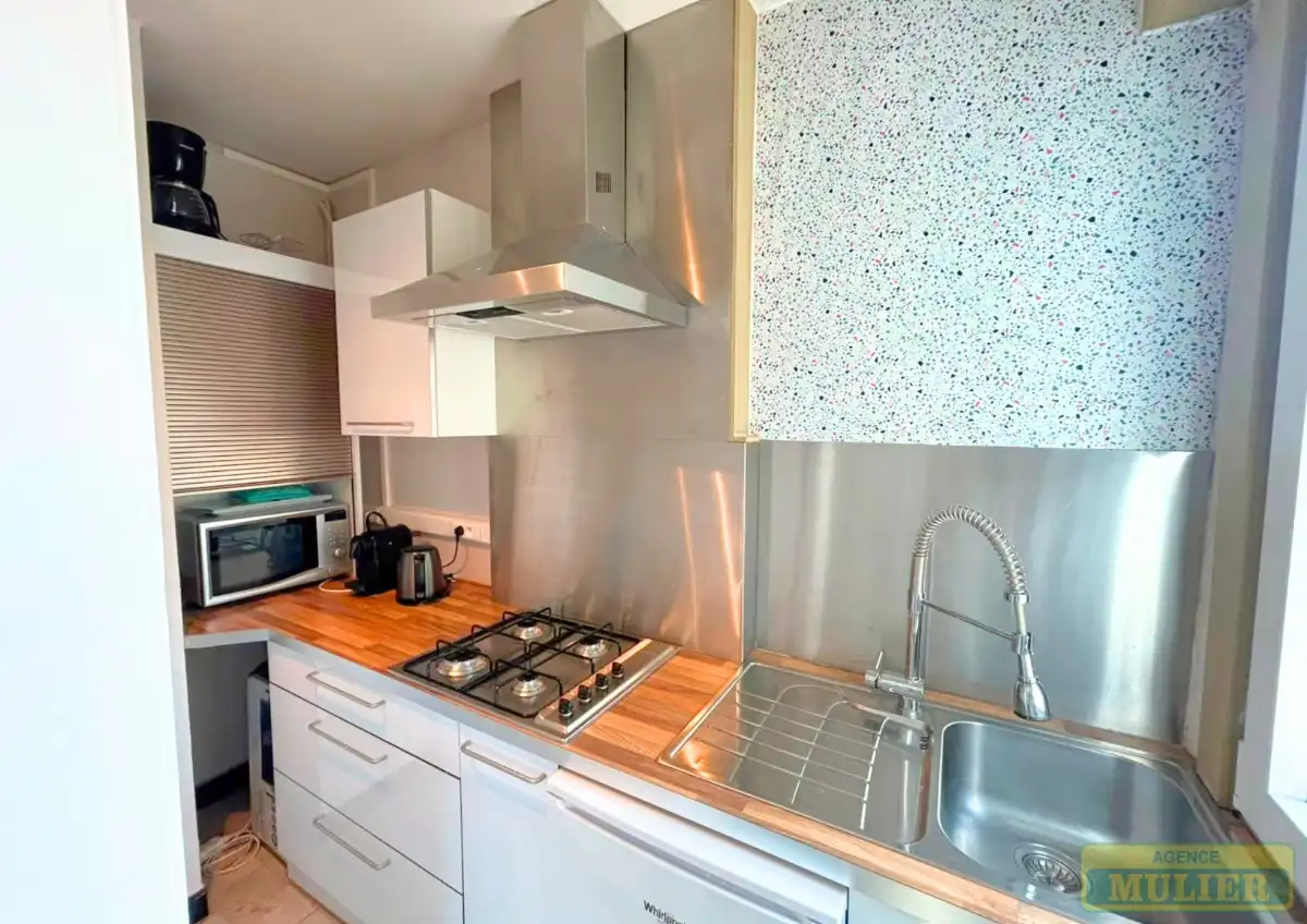 APPARTEMENT MET ZIJDELINGS ZEEZICHT EN 1 SLAAPKAMER TE KOOP TE DE PANNE : foto 9