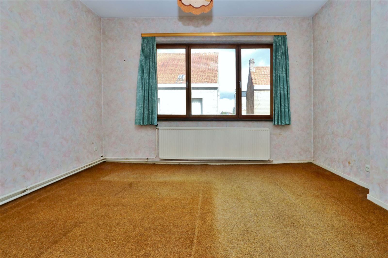Opbrengstwoning met 2 appartementen en 3 garageboxen foto 15