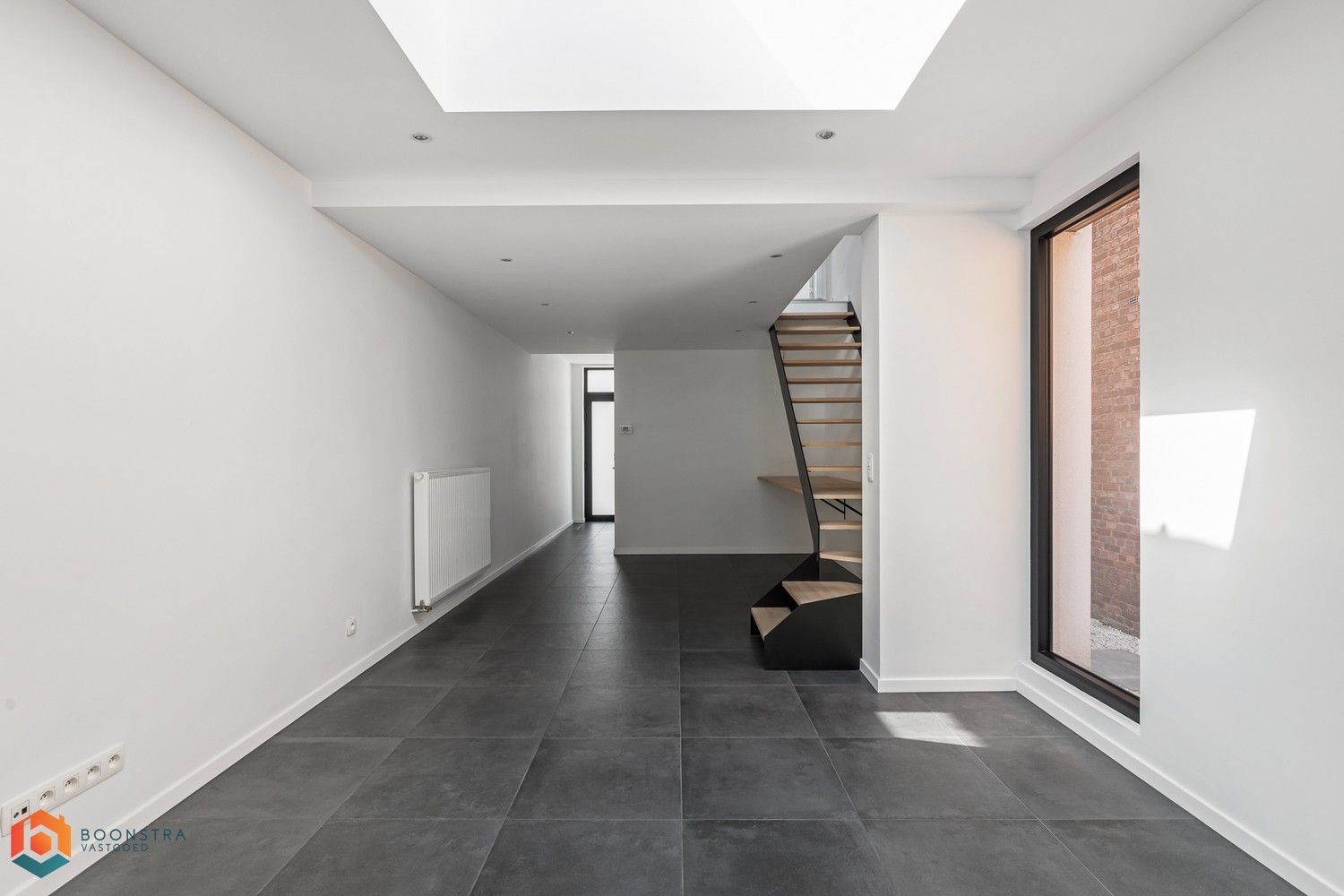 Gerenoveerde woning met 2 slpkrs en tuin te Bonheiden foto 4