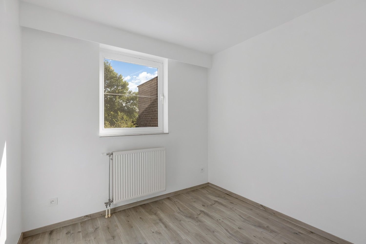 Gerenoveerd appartement met 2 slpkrs en garage foto 10