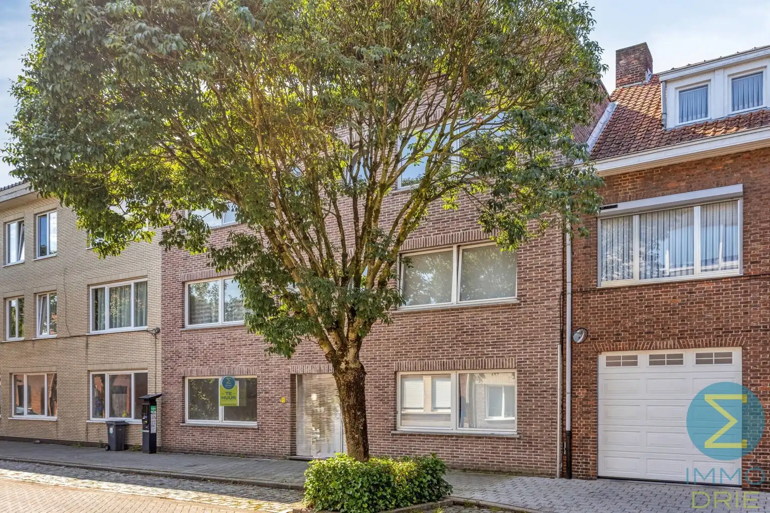 Opbrengsteigendom met 3 verhuurde appartementen en garages foto 18