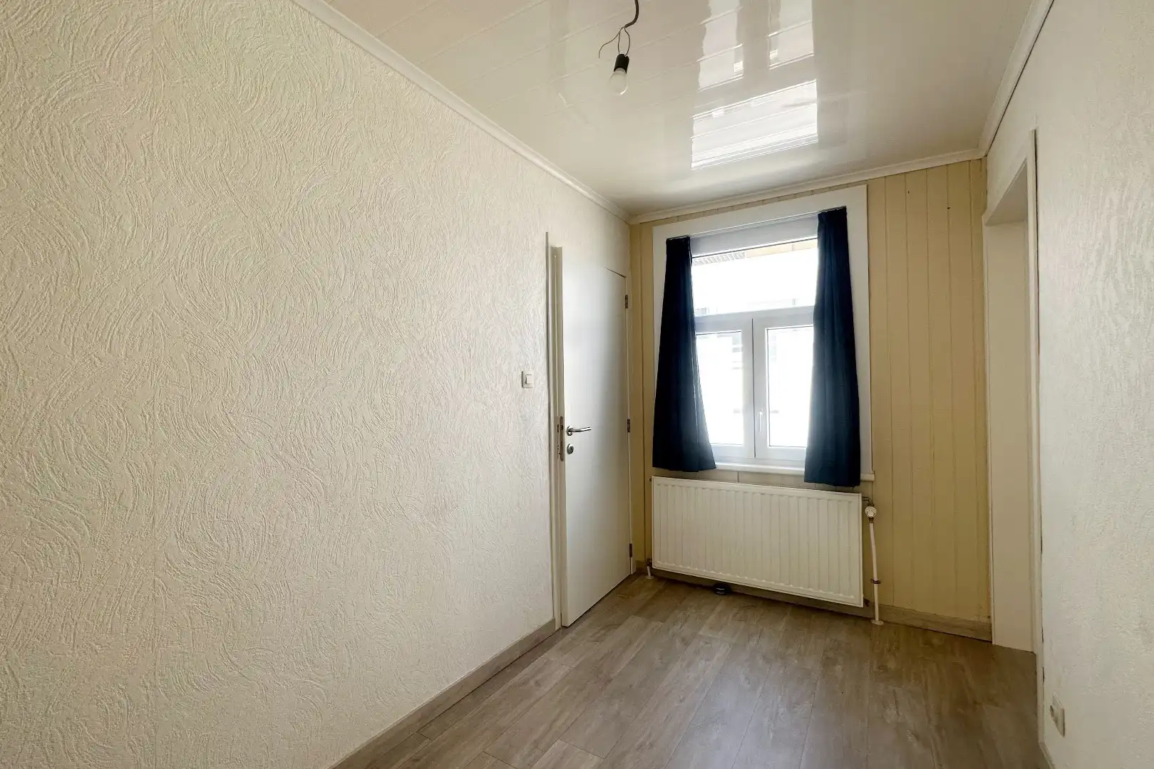 Prachtige interbellumwoning onderverdeeld in drie ruime appartementen foto 14