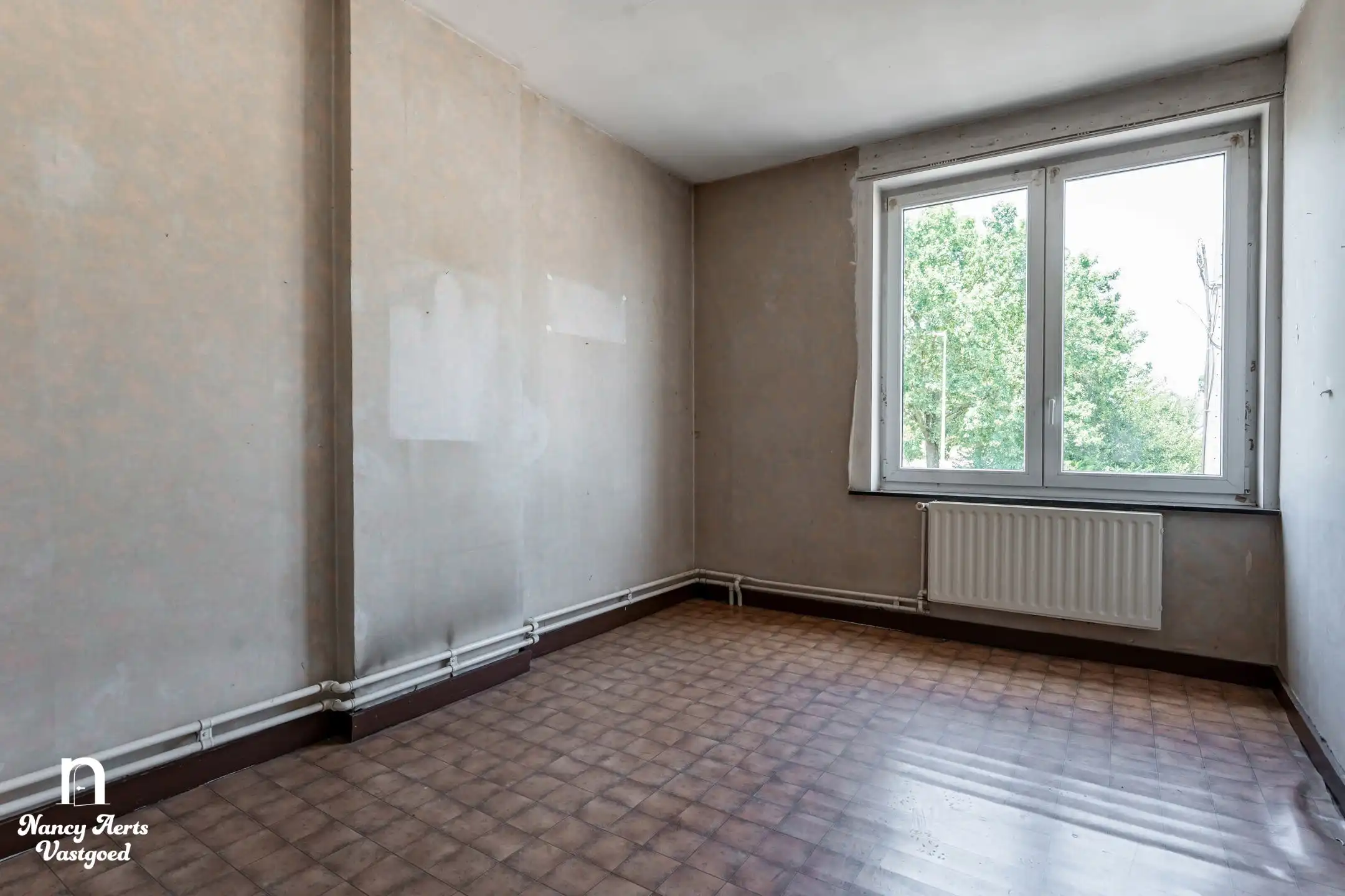 Karaktervolle renovatiewoning met tuin veel potentieel foto 11