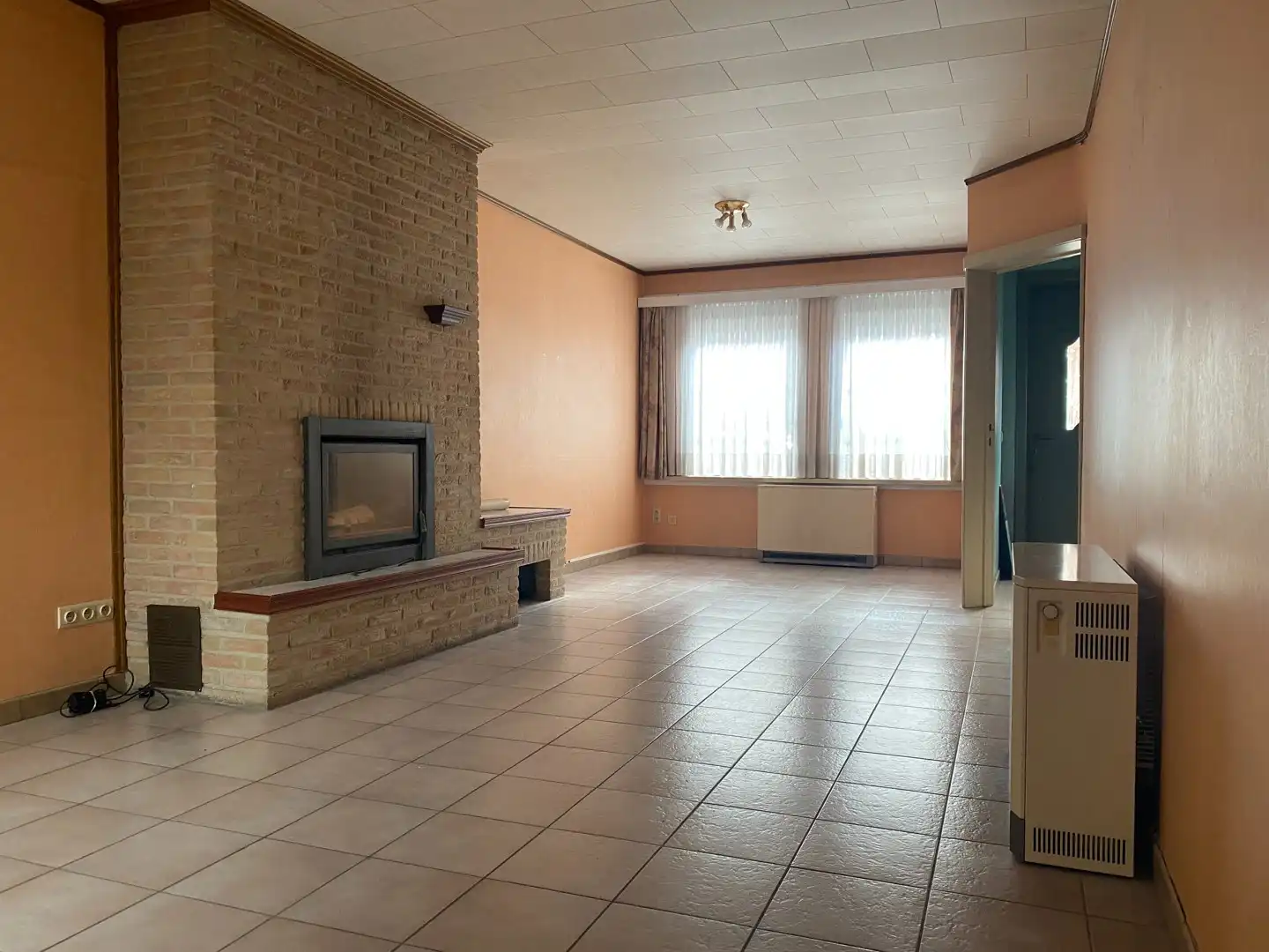 Hoofdfoto van de publicatie: Charmante rijwoning met 2 slpk en koer