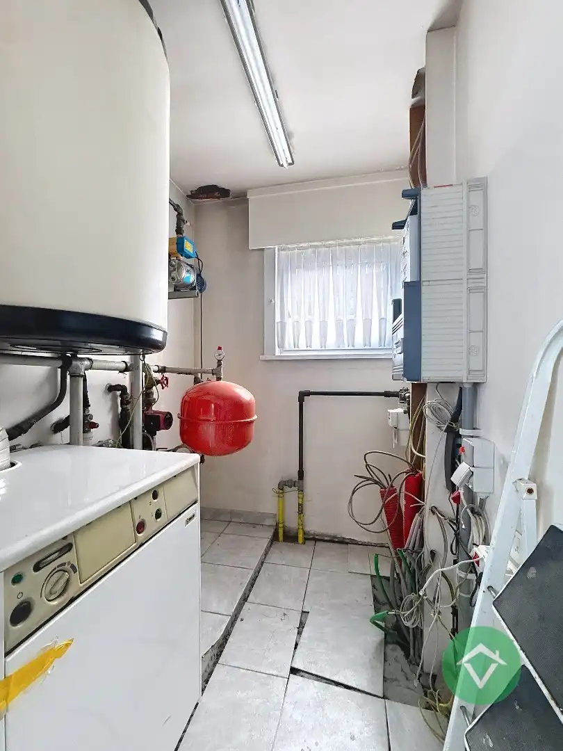 Alleenstaande woning met naastliggend stuk bouwgrond en weide te Eernegem foto 20