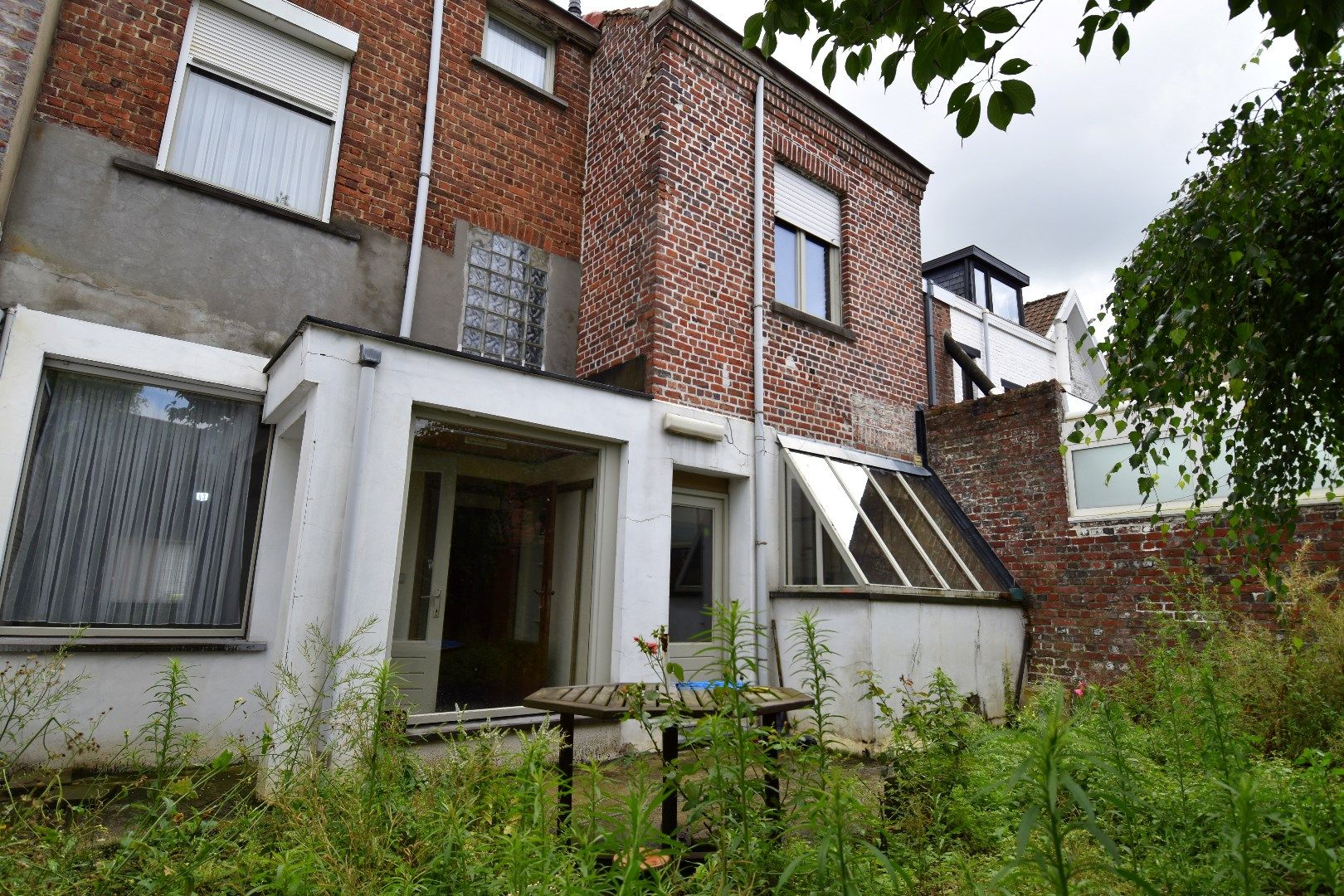 Ruime 3-slaapkamerwoning met bovenliggend appartement (woning) te koop in centrum-Kortrijk foto 14