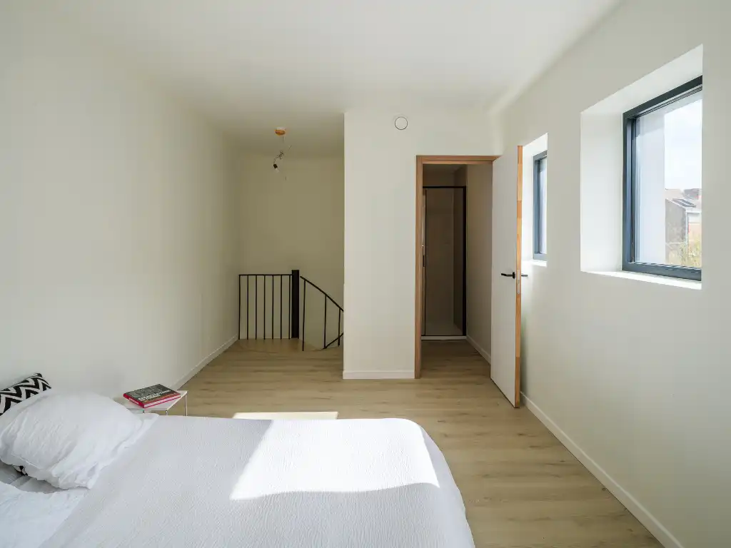 Uniek townhouse-appartement met o.m. 4 slaapkamers, 3 badkamer en een ruim terras. foto 19