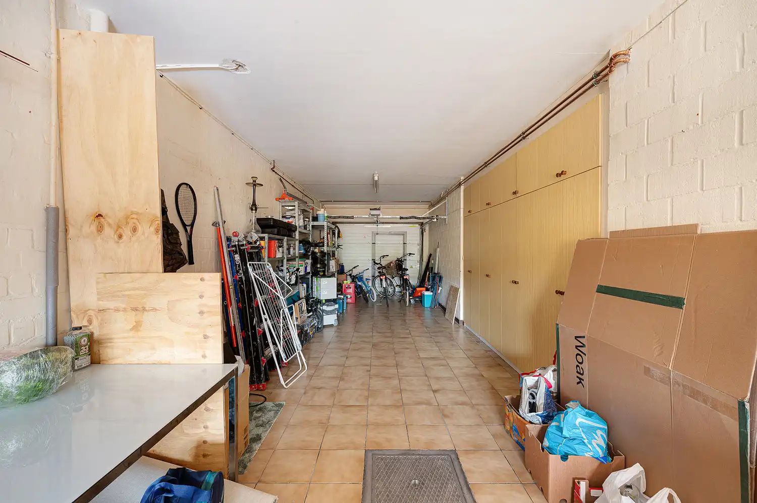 Rustig gelegen bel-etage woning met heel grote garage, oprit en zonnige koer in het centrum van Heist foto 20