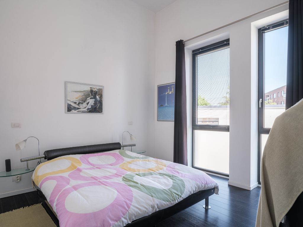 Ruim en lichtrijk 2-slaapkamerappartement met zonneterras in een groene en rustige omgeving vlakbij de Coupure. foto 10