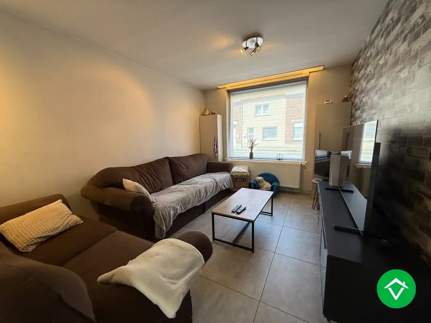 Instapklare woning met drie slaapkamers, tuin met uitweg, zolderkamer te Roeselare foto 3