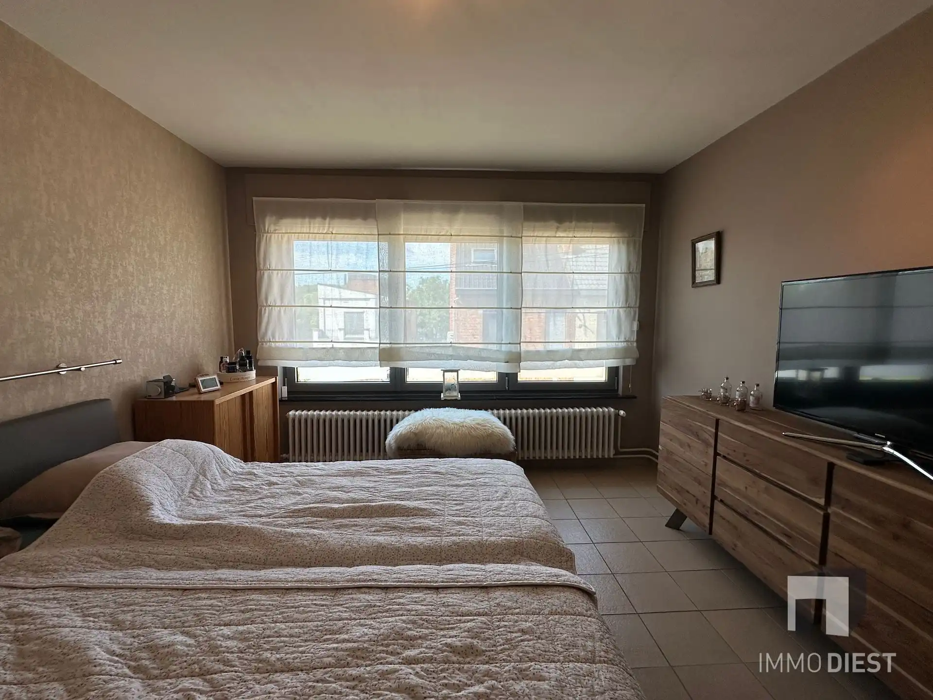 Zonnige woning met 3 slpks, garage en tuin foto 13