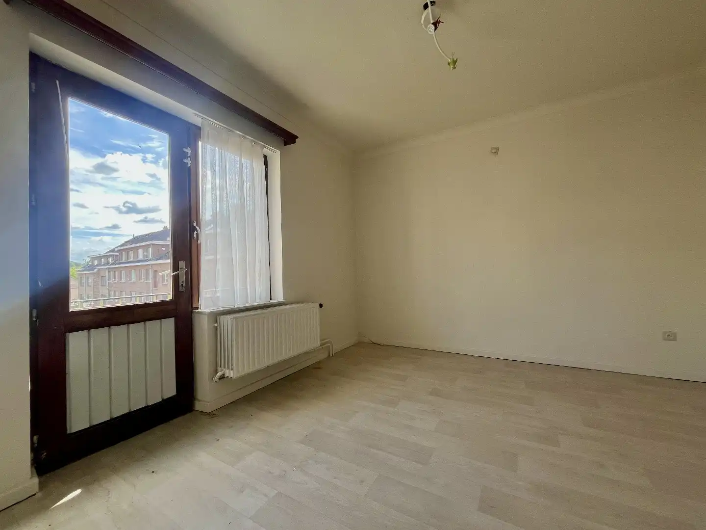 Betaalbaar appartement met twee slaapkamers, kelder en standplaats in hartje Bilzen foto 12