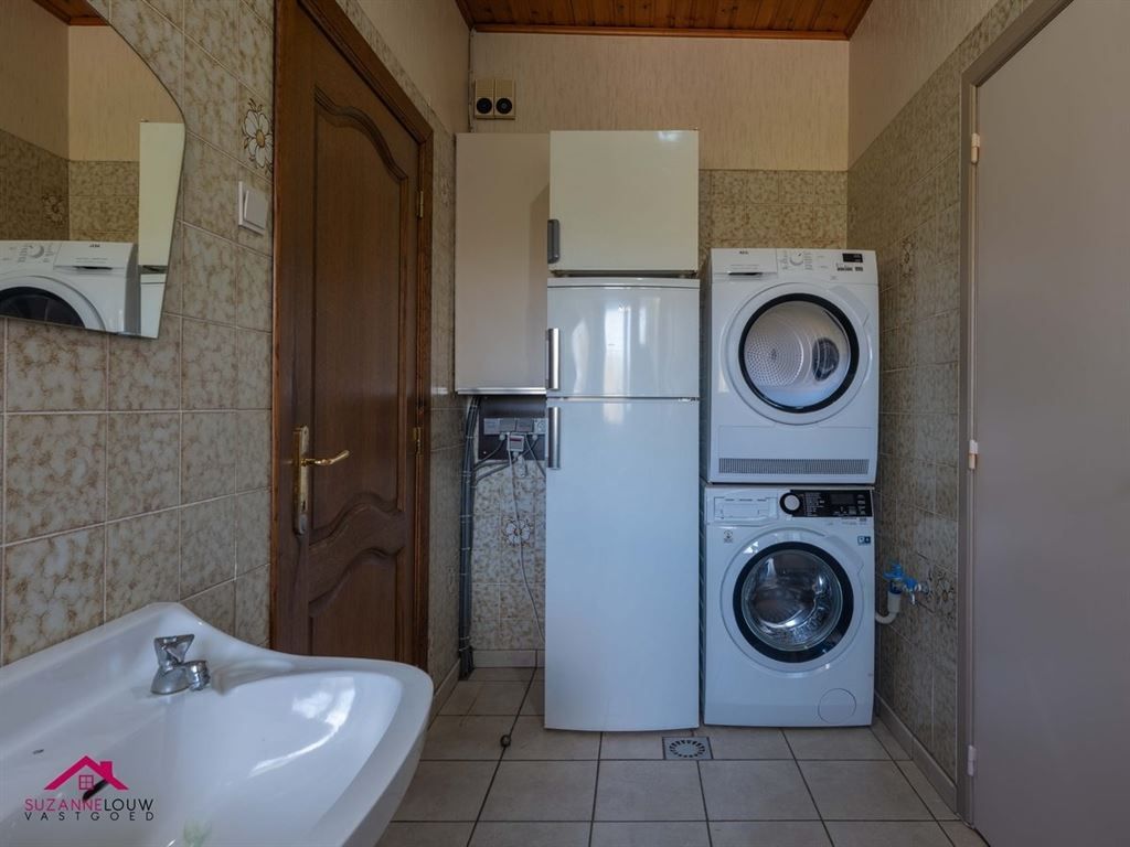 Half vrijstaande woning met garage foto 28