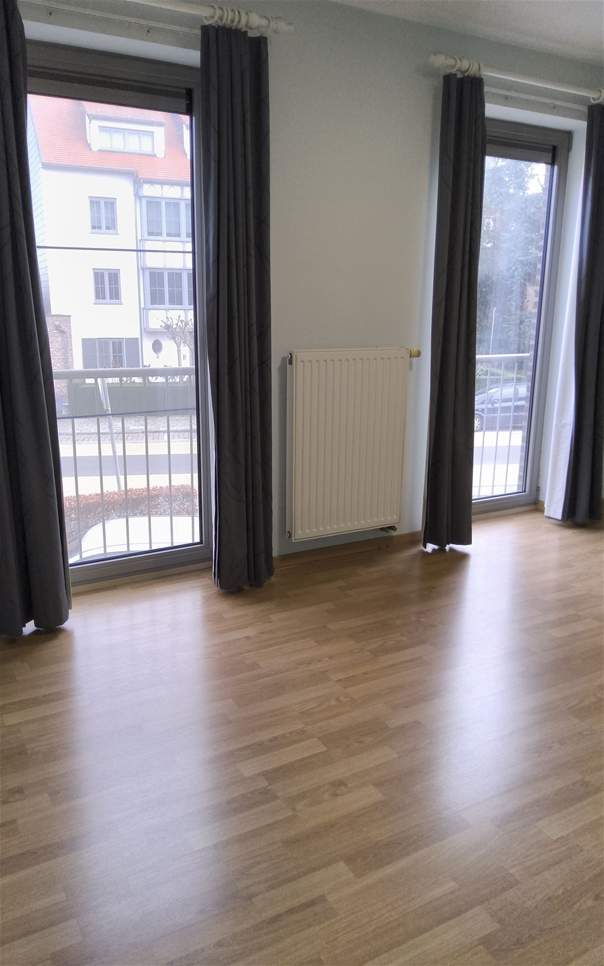 Ruim 2 slaapkamer-appartement met garage foto 21