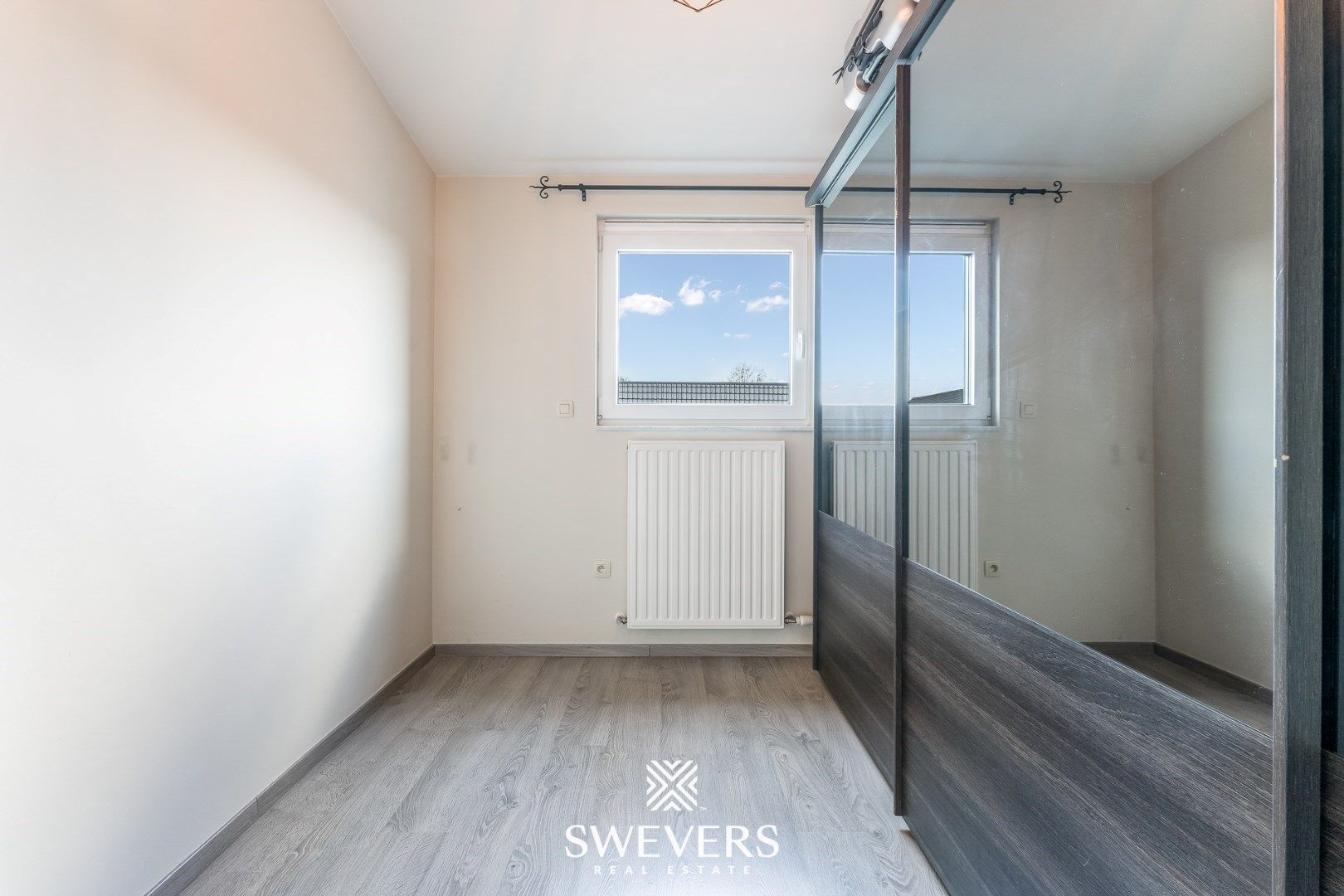 Energiezuinige en instapklare rijwoning met 3 slaapkamers en leuke tuin in hartje Koersel foto 16