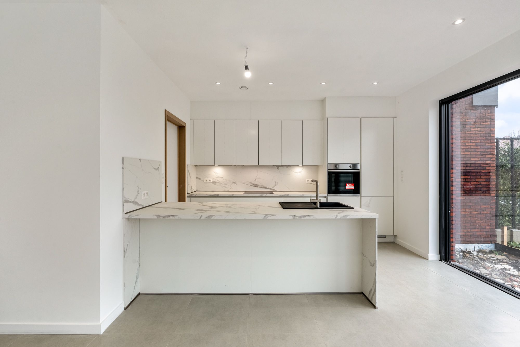 Moderne nieuwbouwwoning met 4 slaapkamers te Alken! foto 6